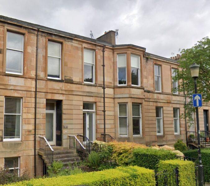Blond sandstone 3 storey terrace, alternate houses (including 12) having bays