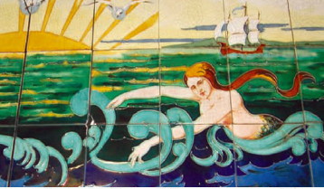 Picture of tiles from shop, with sun, mermaid, ship