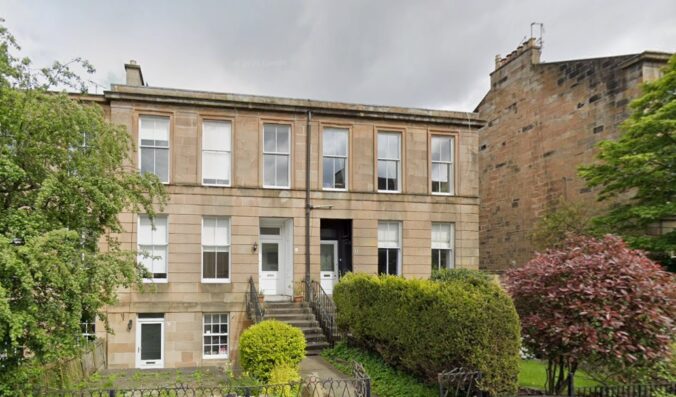 6 & 4 Queen Square forming the two end houses of the terrace; blond sandstone, 3 storeys, stairs up to the main door. A basement window has been converted to a front door./