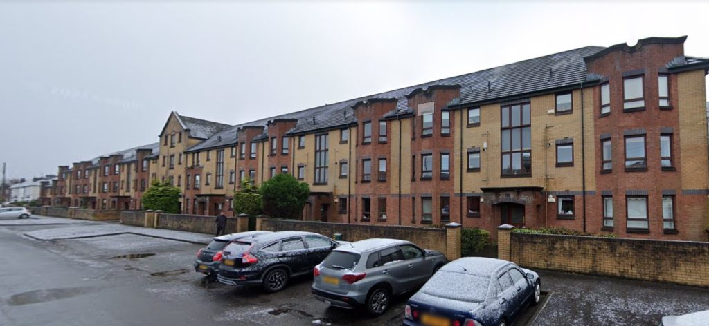 Modernlong block of red and yellow brick housing