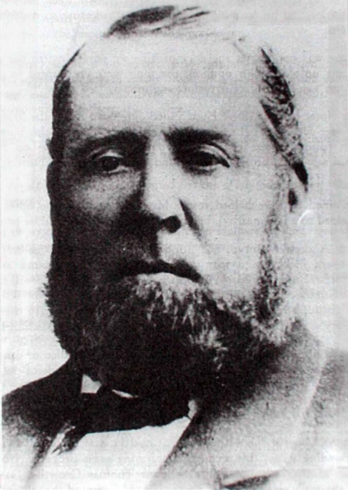 Portrait of balding man with large bushy beard