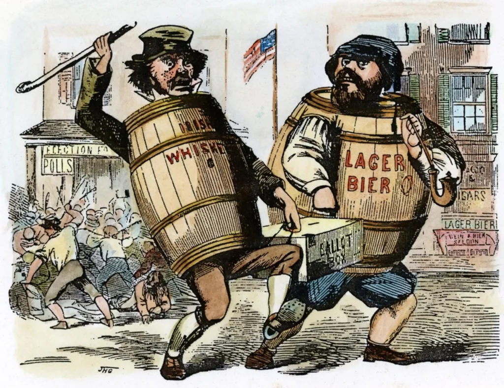 An Irishman and German dressed in a whisky barrel and a lager-bier barrel respectively run off with a ballot box.