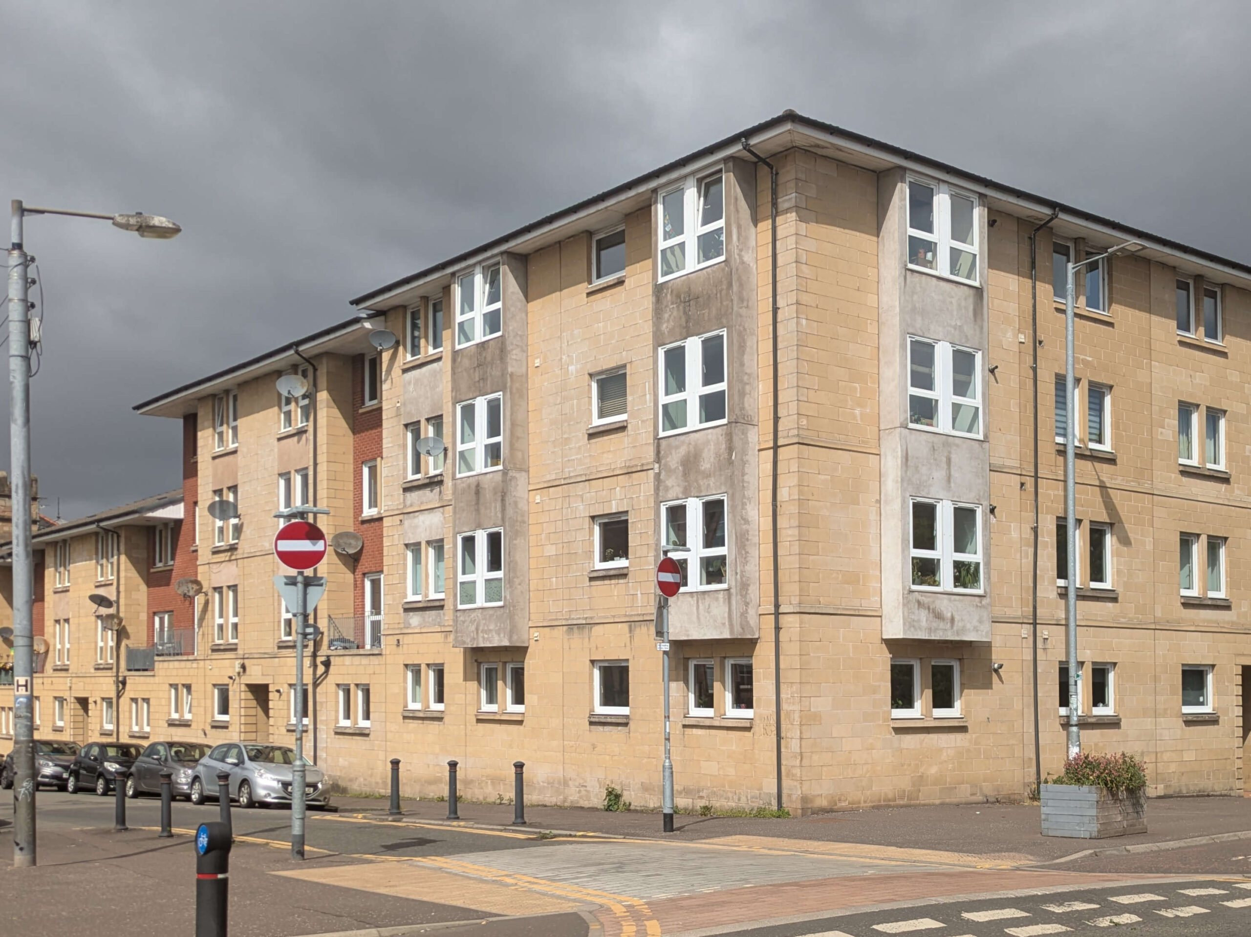 Modern flats on corner of Coplaw Street and Victoria Road, occupying the same site