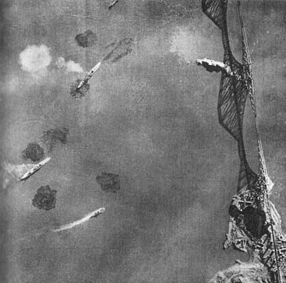 Aerial shot of four vessels visible beside the Forth Rail Bridge