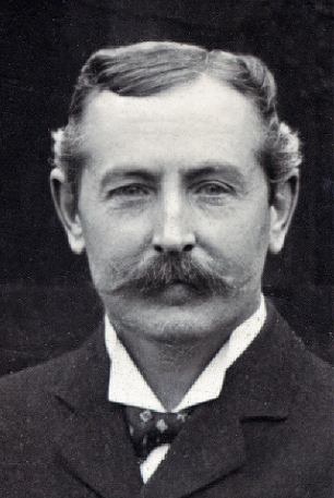 Smart gent with tash, cropped from a team photo