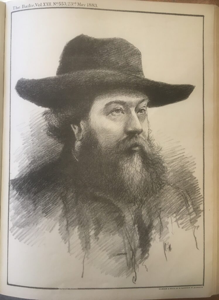 Gent with wide brimmed hat and bushy black beard