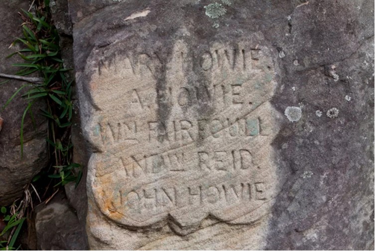 Rock carving of Howie family names