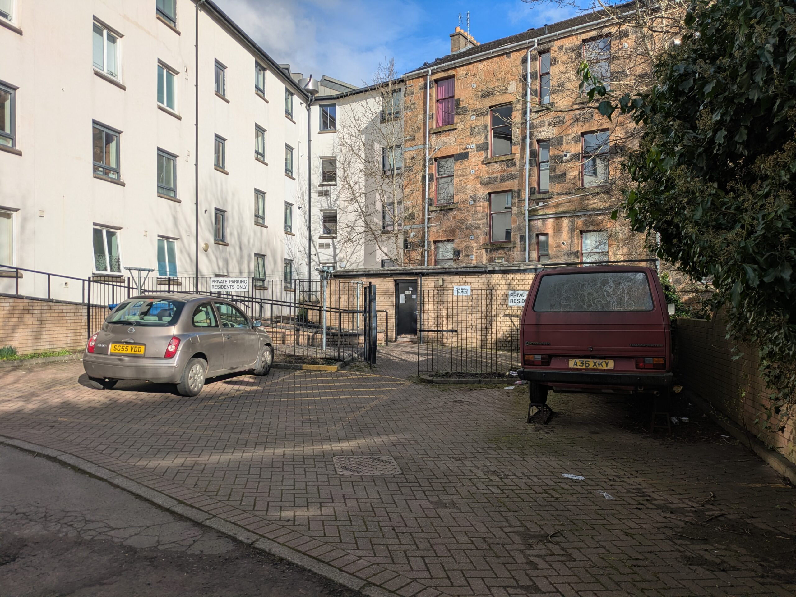 Backcourts of March Street and the new building on Nithsdale Drive, currently used for parking