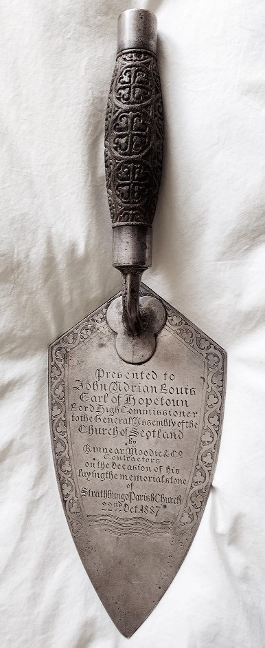 Silver trowel engraved to mark the ceremony, and with decorative engraving around the margin
