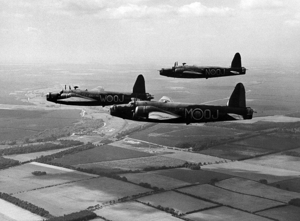 Three Wellington bombers flying in formation